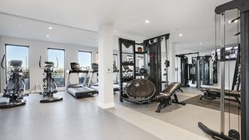 Fitness studio with peloton® bikes & rowing machine